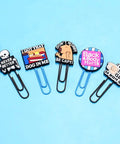 Cheeky 30 Pack Large Funny Paper Clips Set For Office Work Planners with humorous designs on blue background.