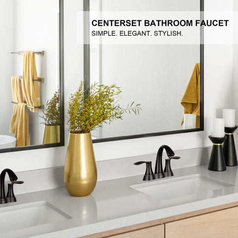 Oil Rubbed Bronze Two Handle 4 Inch Centerset Bathroom Faucet With Pop Up Drain And Included Supply Lines shown in modern vanity