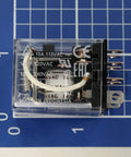 Close-up view of IA General Purpose DPDT Relay Pack Of 2, 24 VAC Coil, 15 Amp Plug In Relay For Industrial Control on blue grid