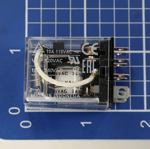 Close-up view of IA General Purpose DPDT Relay Pack Of 2, 24 VAC Coil, 15 Amp Plug In Relay For Industrial Control on blue grid