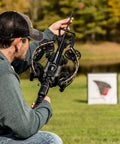 Archer aiming at Beefed Up 18 Inch Archery Target With Self Healing Foam Core For High Power Bows Up To 450 FPS And 222 ft lbs