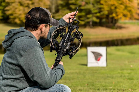Archer aiming at Beefed Up 18 Inch Archery Target With Self Healing Foam Core For High Power Bows Up To 450 FPS And 222 ft lbs