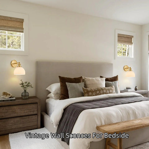 BELVM Vintage Milk Glass Wall Sconce Set of 2 - Gold Bathroom Wall Lights illuminating a cozy bedroom beside the bed.