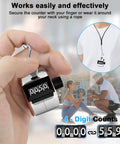 Real Deal Heavy Duty Two Pack Metal Tally Clickers In Bright Silver, shown in hand and worn around neck for easy tracking.