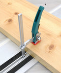 Beefy And Stable Bench Dog Hole Clamps For Woodworking Tables And Workbenches Steel Table Clamps with Ratchet Lock in action securing wood.
