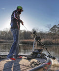 Person using G Force Heavy Duty Trolling Motor Replacement Handle With Cushioned Grip And Release Cord Nylon Jacketed Stainless Steel Cable For Tourney Grade Performance Red on a boat
