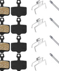 Image showing 4 pairs resin disc brake pads for mountain bikes with dope stopping power compatible with Elixir 1 3 5 7 9 R and Sram XO XX X7 X9 XXWC DB1 DB3 DB5 low noise quick break in smooth modulation durable replacement pads, along with metal clips and pins.