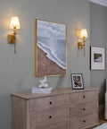 Boho Industrial Wall Sconce Set Of 2 With Brass Antique Finish And Champagne Fabric Shade in bedroom setting