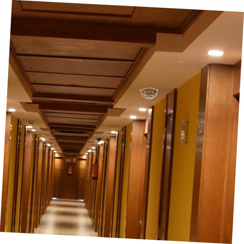 Premium Stainless Steel Fire Sprinkler Head Deflector in hotel corridor designed to protect fixtures from bumps and dents.