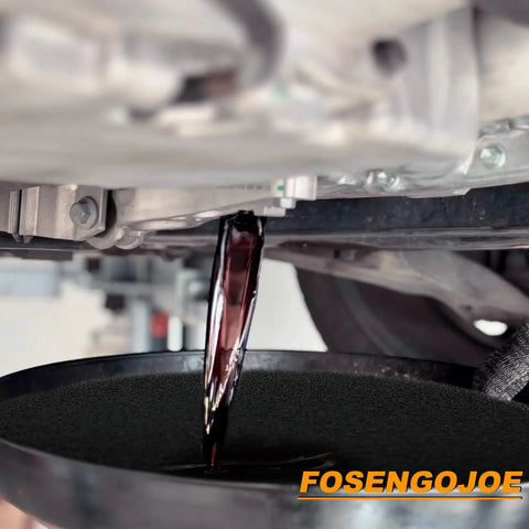 Oil pouring into Two Pack 19.7 Inch Oil Drain Pan Splash Pads For Oil Changes, Heavy Duty Filter Sponge Mats beneath a car.