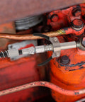 Grease Gun Accessory Kit That Hooks You Up With 18 Inch Spring Flex Hose Normal Coupler And Double Handle Quick Lock Release Coupler Tips Nozzles For All One Eighth Inch NPT Grease Gun Adapter Fittings Ten Thousand PSI attached to machinery