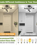 Side-by-side comparison of 2 Light Black Vanity Light Fixture Over Mirror With Clear Glass Shades Go-To Modern Wall Sconce Lighting For Bathroom Bedroom Living Room Hallway E26 Base Bulbs Not Included using different bulb temperatures, 2700K Warm White and 5000K Daylight.