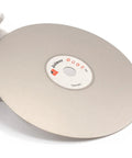 Heavy Duty Six Inch 2000 Grit Diamond Grinding Disc For Gemstone Glass And Rock Polish Tough As Nails For Knockout Lapidary and Hobby Crafting Projects  in hand.