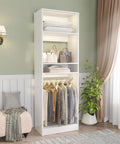 Freestanding Closet System With Adjustable Hanging Rods And Super Sturdy Steel Frame Built For No Sweat Setup And Roomy Multi Purpose Wardrobe Shoe Storage Tower featuring white shelving and clothing display.