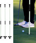 Three Portable Golf Flagstick For Putting Green, Detachable Fiberglass Flag Poles in use on a golf course green.