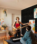 Totally Rad 3D Acoustic Panels For Walls Soundproofing Foam Tiles 12X12 Inches Black Textured, enhancing music studio ambiance.