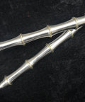 Handmade Chinese Kung Fu Sword Pair With Stainless Steel Blade And Brass Fittings close-up handle detail