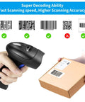 Handheld USB 1D Barcode Scanner With Stand Wired CCD Barcode Reader For POS Systems Stores Supermarkets And Warehouses Fast 1D Code Scanning From Paper Or Screen Supports UPC EAN Code 128 And More Easy Setup And Beast Build in use scanning a package barcode.