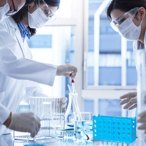 Scientists using Interlocking Four-Way Test Tube Rack Set, 8 Pack Budget-Friendly Color-Coded Holders For 0.5ml To 50ml Tubes
