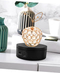 Levemolo Electric Rotating Turntable Display Stand For Jewelry And Watches 360 Degree Spin Base with crystal apple centerpiece.