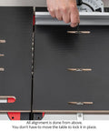 StealthStop Miter Sled With Drop Zone showing fence adjustment for precise cross-cut alignment on table saw setup.