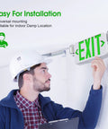 Person installing LED Combo Emergency Exit Sign Light With Two Adjustable Heads And Backup Battery For Commercial Spaces