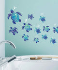 12 Pcs Sea Turtle Wall Decals Set Ocean Turtle Vinyl Stickers For Bathroom Kitchen Nursery And Office Waterproof Underwater Wall Art Decor For Home Blue shown above bathtub on light blue wall