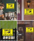 4 Pack Smile Youre On Camera Signs 8x12 Rust Free Aluminum Outdoor Video Surveillance Signs displayed in various locations