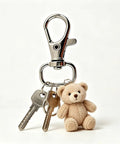 Hella Durable Zinc Alloy Swivel Snap Hooks And D Rings For Purse Hardware, Keychain Crafting, Sewing, 122 Piece Kit With Smooth Turn Clasps, Half Inch Opening, Total Breeze To Use; snap hook holding keys and teddy bear.