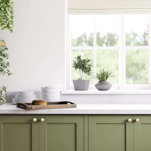 Top Shelf Solid Cabinet and Drawer Knob Sets with Kickass Brushed Gold Finish Crafted from Heavy Duty Zinc Alloy for Built Tough Kitchen and Bath Remodel Upgrades featured on green cabinet.