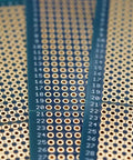 Close-up of 3 Piece Solderable Breadboard Split Design Universal PCB Shield Board Double Sided With Tinned Gold Plated Holes