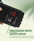 Person holding Pin Moisture Meter For Wood And Drywall Construction And Flooring With Auto Hold Humidity Detection