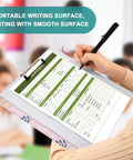 Person writing on Totally Squirrel Pink Cute 3 Ring Binder With Clipboard 1.5 Inch Holds Up To 200 Sheets, in a classroom setting