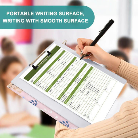 Person writing on Totally Squirrel Pink Cute 3 Ring Binder With Clipboard 1.5 Inch Holds Up To 200 Sheets, in a classroom setting
