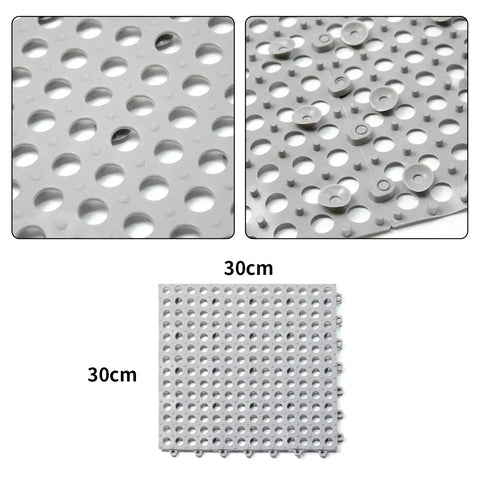 Close-up of 24 Pack Drainage Floor Mats With Interlocking Cushions, Non Slip PVC Mats for bathroom shower; suction cup detail, 30x30cm, grey.
