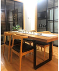 Heavy Duty Solid Steel Table Legs With Elegant Arc Shape And Glossy Silver Coating, No Sweat Cleaning Anti Slip Mounts For Kitchen Or Bathroom Fixes In 70X70CM, Hella Sturdy Supports, viewed in modern dining setting with wooden table and chairs.