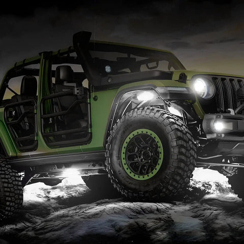 Four Pod LED Rock Lights Kit For Trucks And Off Road Rigs IP67 Waterproof Underbody Glow Lighting on green SUV
