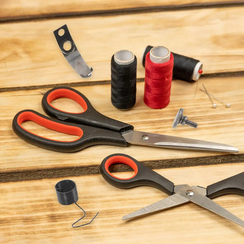 Pro Grade Sewing Machine Replacement Screw Kit With Spring Set for Industrial Flat Machines on wooden surface with scissors and threads.