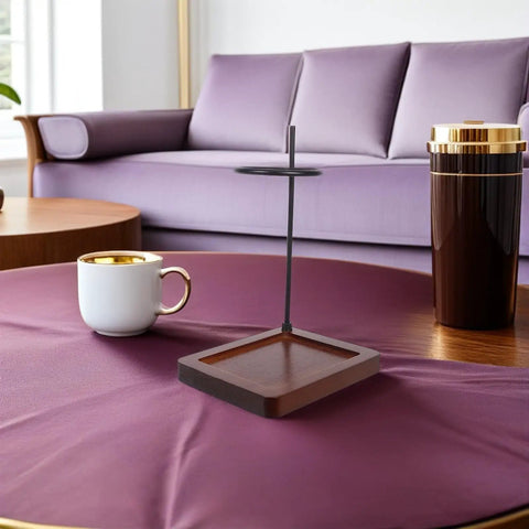 Top Shelf Wood Coffee Dripper Stand Built Tough With Stainless Base on a table next to a coffee mug and thermos.