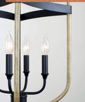 Close-up of Austen 26 Inch 4 Light Modern Farmhouse Lantern Pendant Light with smoked birch frame and black accents.