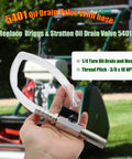 Person holding 5401 Stainless Steel Oil Drain Valve With One Quarter Turn And Hose, Three Eighths By Eighteen NPTF Thread