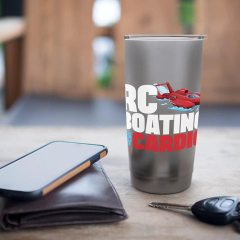 Boating Is My Cardio Insulated Stainless Steel Tumbler on table with phone and keys, leak-proof lid visible