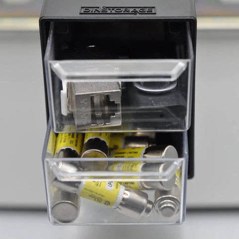 Two-Drawer Control Panel Organizer for DIN Rail Or Flat Surface With One-Click Toolless Install filled with fuses and relays