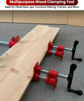 Heavy Duty Cast Iron Pipe Clamps 4 Pack For Real Woodworking Tough As Nails Jig And Wood Glue Press holding wooden boards.