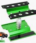 Adjustable Aluminum RC Car Repair Stand With 360 Degree Rotation showing green base, black upper plate and scale model car.