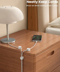 8 Pack Cord Organizer With 1s Spring Lock Cable Clips on nightstand holding phone charger cables