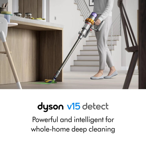 Person using V15 Detect Cordless Vacuum Cleaner With Smart Dust Detection And Power Trigger in a modern home setting.