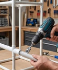 Person using Nifty 4 In 1 Pvc Pipe Threader Kit Cuts Threads Taps Grooves And Preps Fittings For 1/2 3/4 And 1 Inch Pipes with a drill.