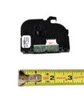 Travel Control Module For LiftMaster And Sears Garage Door Openers OEM Replacement Part In Black next to measuring tape