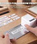 Straight To Point Color Handheld Printer For Paper And Cardstock With Guided Edge Ruler Makes No Stress Diy Craft Labels Fast Homework Signs And Total Organization Wins on a desk, printing narrow labels.